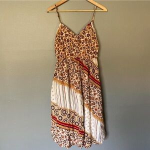 Aerie Tan & Cream floral boho sleeveless mini dress w/ elastic waist
Size: Large